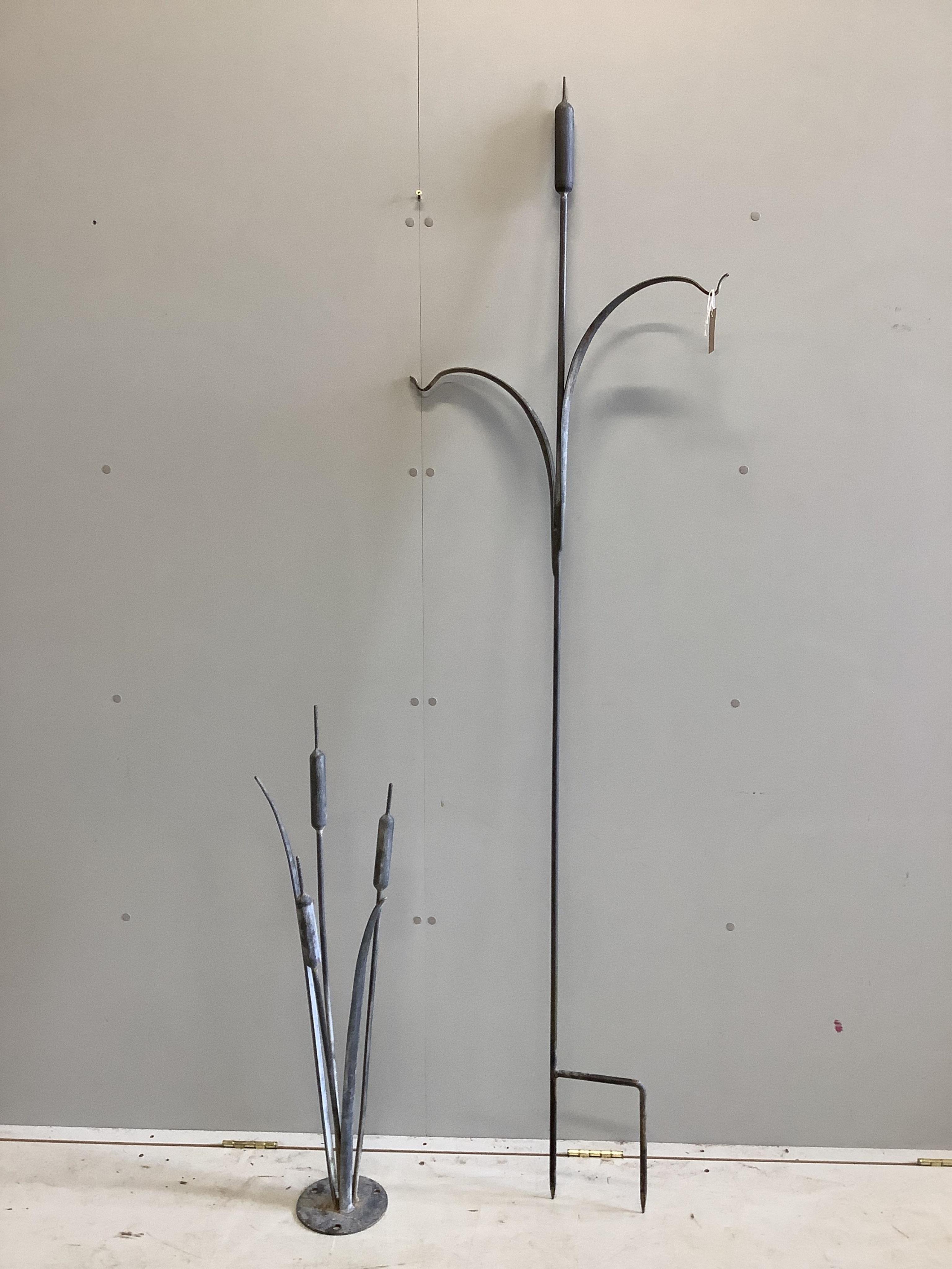 Two Ian Gill forged steel bulrush and reed garden sculptures, (one a bird feeder stand), larger height 200cm. Condition - good